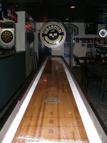 Shuffleboard Table. Or is most commonly Offind a look for shuffleboard a 